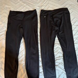 2 pairs of Fabletics Power Luxe Leggings Size L with side pockets